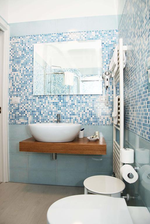 Falli Exclusive Rooms And Breakfast -Con Parcheggio Privato E Gratuito- ポルト・チェザーレオ 部屋 写真